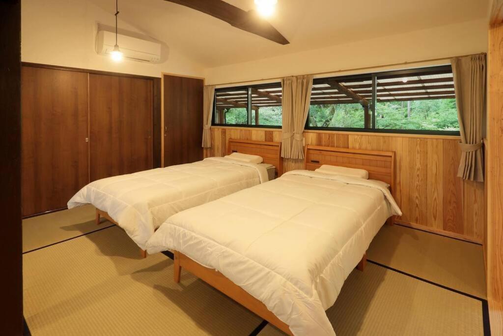 【コテージくぎの】大谷川沿いの露天風呂があるコテージ Minamiaso Exterior foto